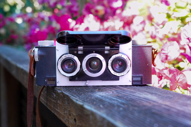 Front side of Stereo Realist Stereoscopic 3D Camera with cover flap open, stylized image