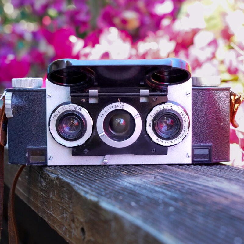 Front side of Stereo Realist Stereoscopic 3D Camera with cover flap open, stylized image