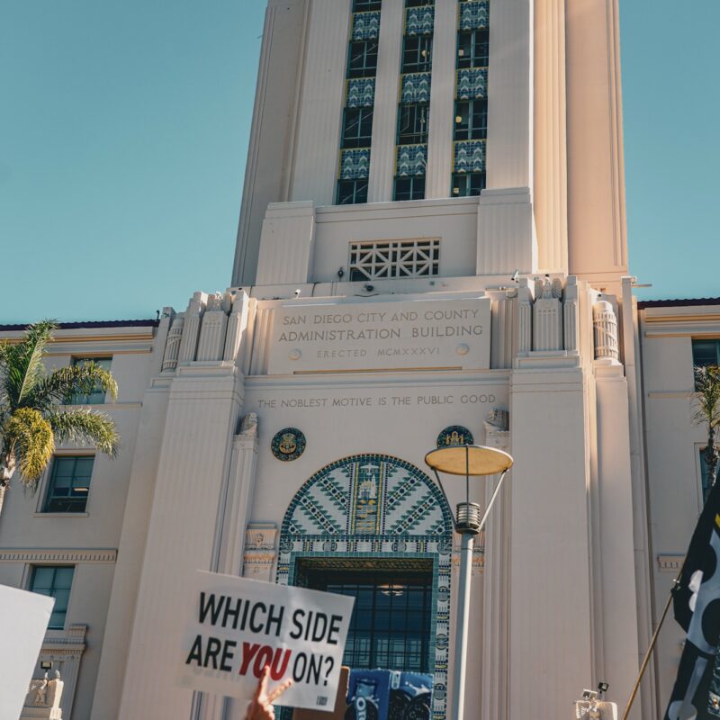 No Kings Day San Diego October 18 2025 - San Diego City Hall building with a sign that says "Which side are you on?"