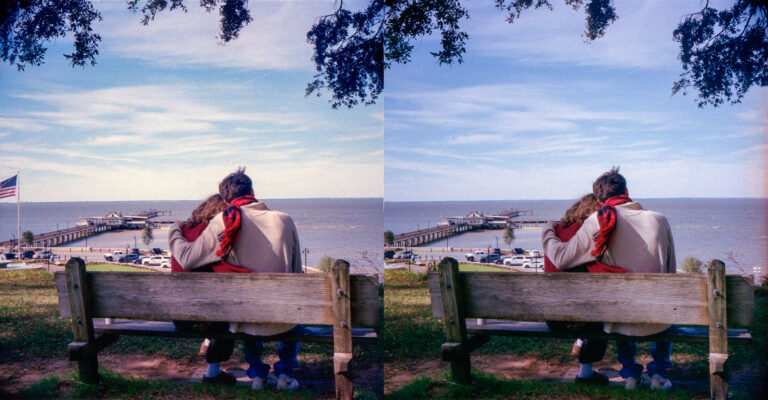 Stereoscopic 3D film photo of a cuddly couple on a park bench overlooking the ocean. Shot on the Stereo Realist Camera. Fairhope, Alabama.