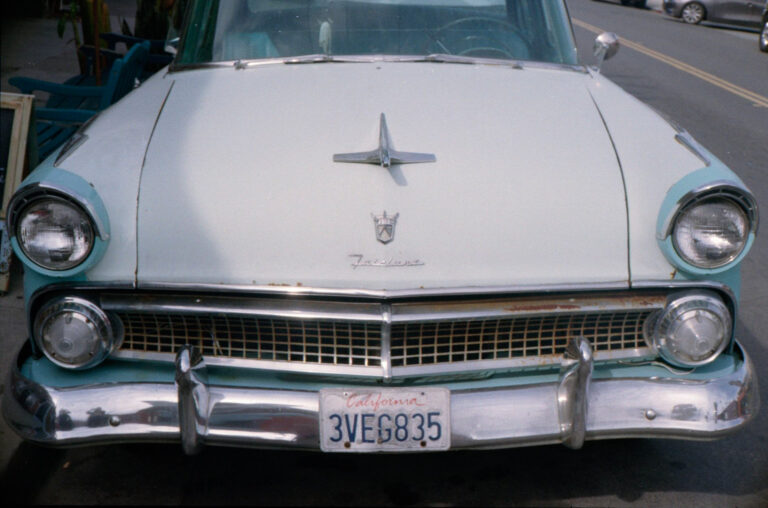 vintage Ford Fairlane parked on street in Ocean Beach San Diego, Yashica Electro 35 film photography