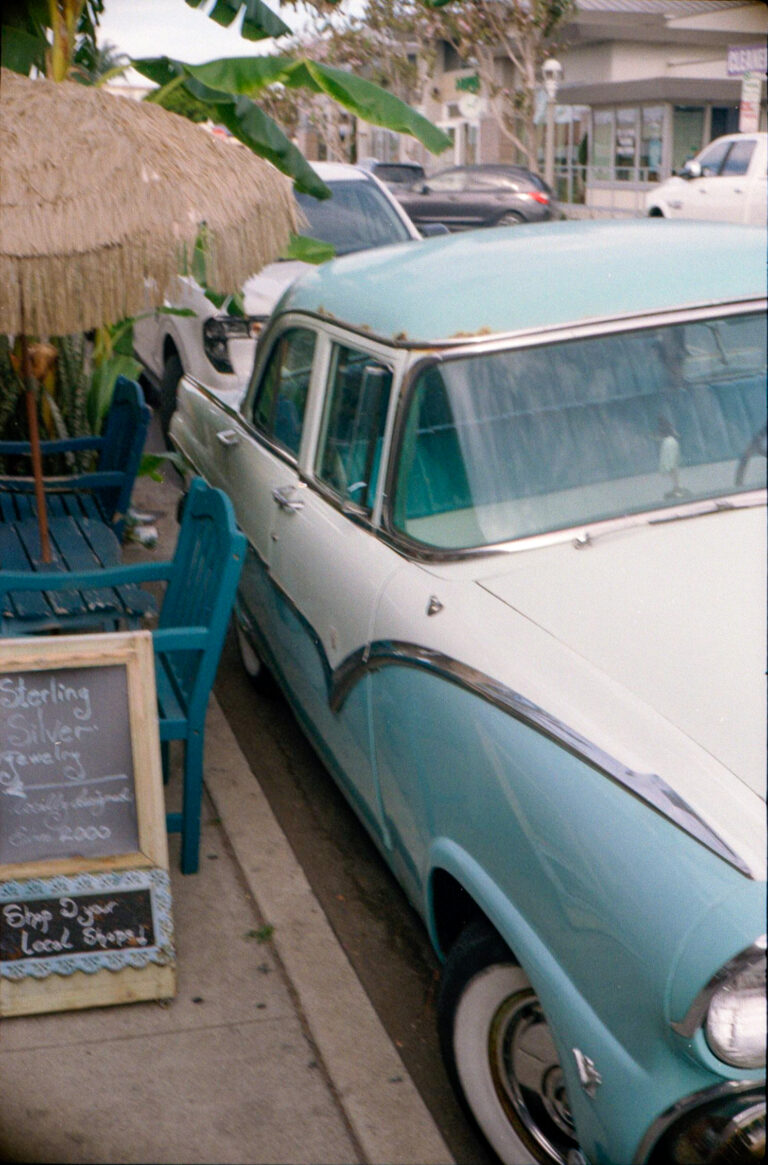 vintage Ford Fairlane parked on Newport Avenue Ocean Beach San Diego, Yashica Electro 35