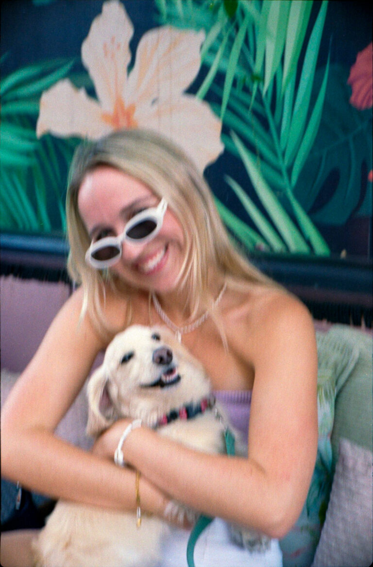 woman holding dachshund puppy at Flamingo Deck Pacific Beach San Diego, Yashica Electro 35