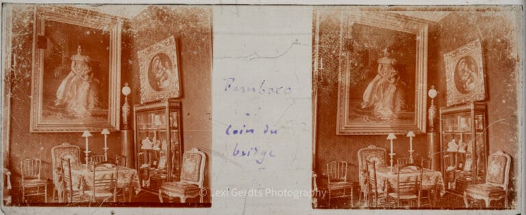 Antique Vérascope Richard stereoscopic glass slide captioned "coin du bridge" showing a richly furnished interior corner at Farnborough Hill, Empress Eugénie's Hampshire estate, circa 1907–1920