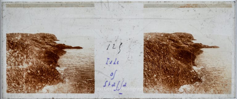 Antique stereoscopic glass slide numbered 125 and captioned "Isle of Staffa" showing the basalt sea-cliff coastline of the Isle of Staffa in the Inner Hebrides, Scotland. From Empress Eugenie Verascope Richard collection.
