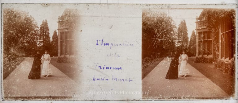 Antique Vérascope Richard glass slide captioned "L'Impératrice et la Princesse Lucien Murat" showing Empress Eugénie in black and Princess Murat in white standing outdoors at Farnborough Hill, Hampshire. From Empress Eugenie Verascope Richard collection.