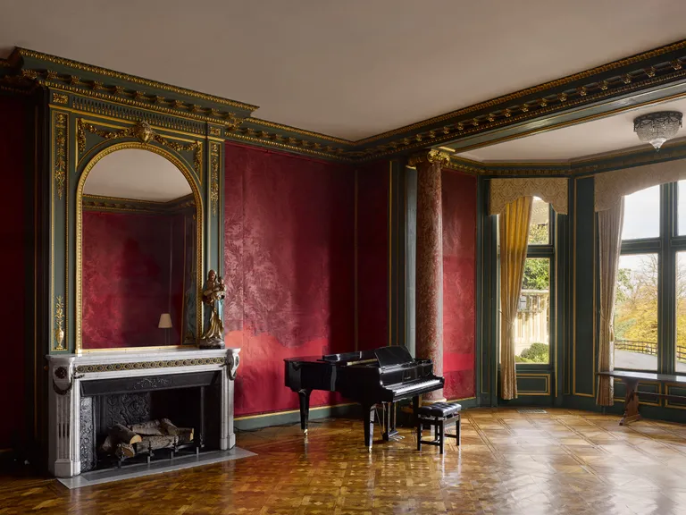 The Grand Salon at Farnborough Hill, one of the last rooms the Empress decorated, preserved by the school that purchased the house in 1927. The silk hangings survive from her time, though the imperial collection that once filled the room has long since scattered. (Photo: Country Life / Will Pryce)